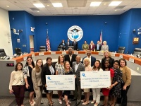 Dillard High 6-12 and Lauderdale Lakes Middle School each received a $50,000 Classroom Makeover Grant from Florida Power & Light Company in front of the Broward County school board.