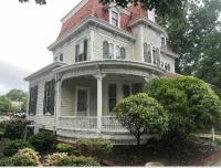 The Delaware State University (DSU) Downtown campus in Dover, Delaware, will rehabilitate a pre-1885, three-story frame building with Queen Anne architectural features including a mansard roof and an expansive porch. Courtesy of  Delaware State University