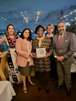 L to R: International Coaching Federation’s Stephanie Norris, ICF Awards Dir.; ICF Global Board Chair Shweta Handa-Gupta, MCC; Distinguished Coach Award recipient Cheryl Procter-Rogers, MCC; ICF CEO Magdalena Nowicka Mook; and ICF COO Todd Hamilton