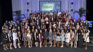 2018 Disney Dreamers join Mickey Mouse and (center, L-R): ESSENCE Magazine Editor-at-Large Mikki Taylor; President of ESSENCE Communications Michelle Ebanks; Steve Harvey and Disney Executive Champion of Disney Dreamers Academy Tracey D. Powell on Sunday,