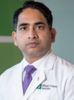 Manmeet Ahluwalia, M.D., deputy director, chief scientific officer and chief of solid tumor medical oncology at Miami Cancer Institute
